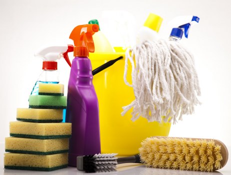After builders cleaning team vacuuming floors in a commercial space